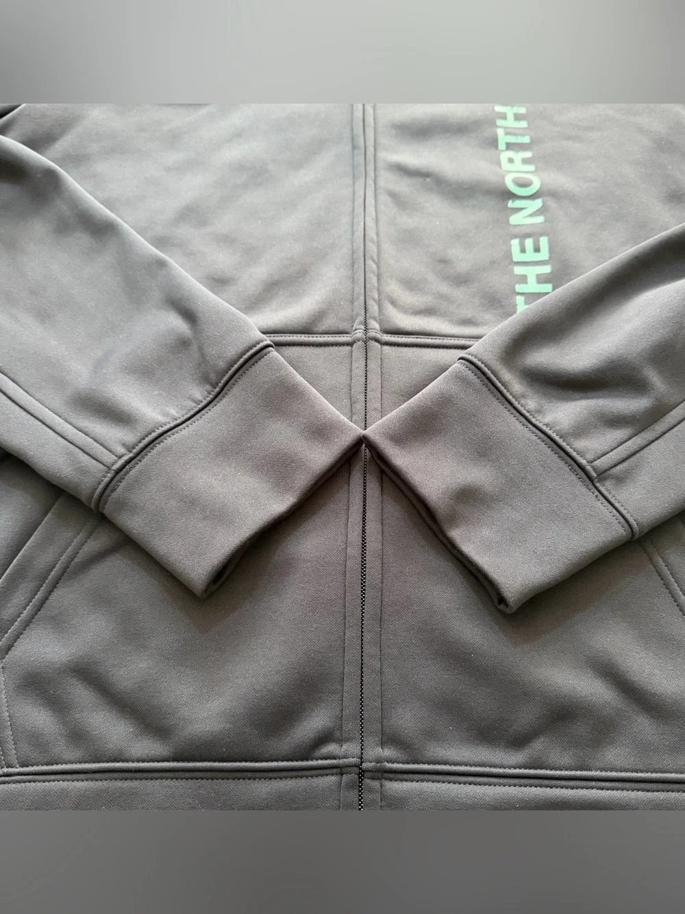 The North Face Navy Hoodie with Teal Logo and Drawcords